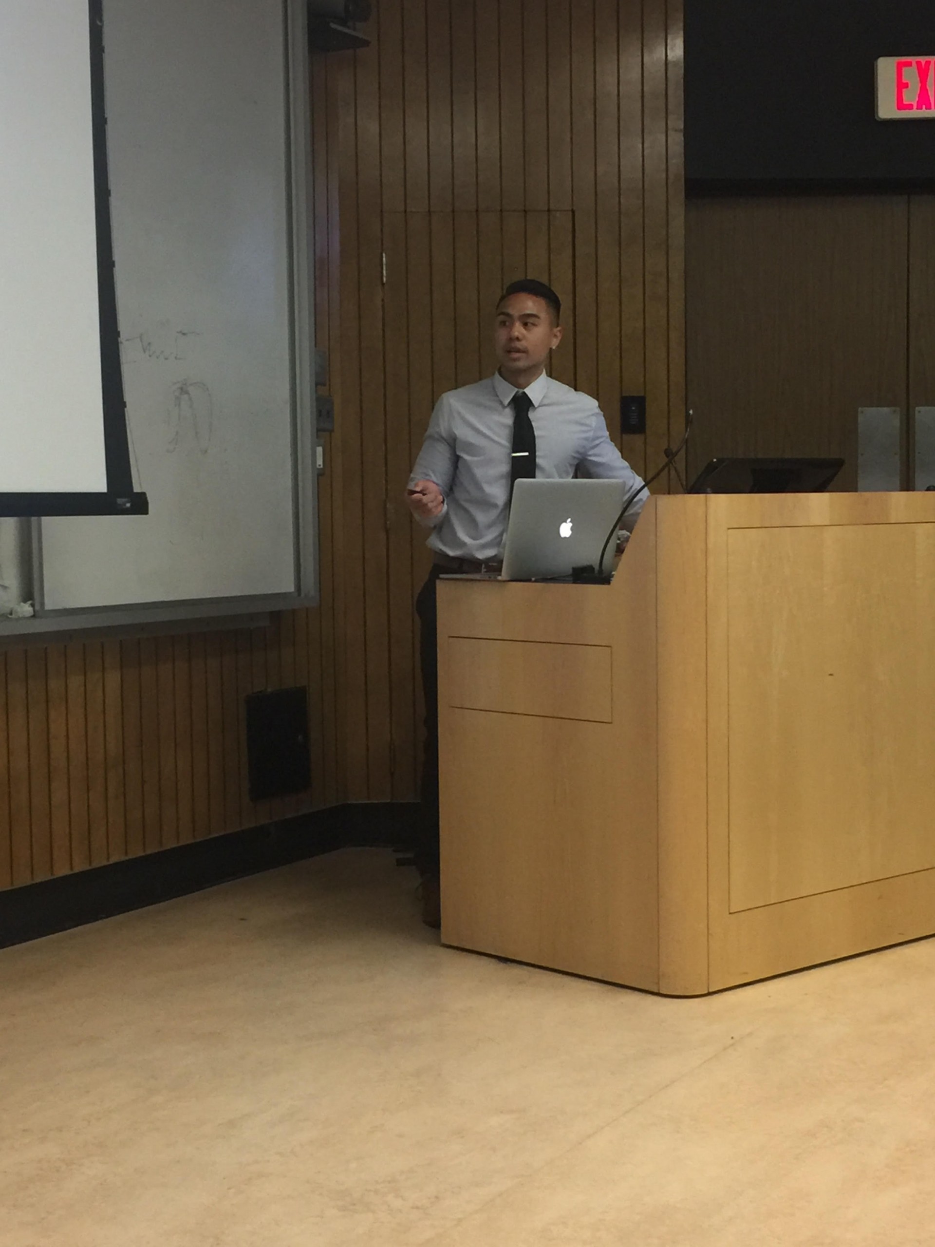 Brian Truong giving his dissertation defense