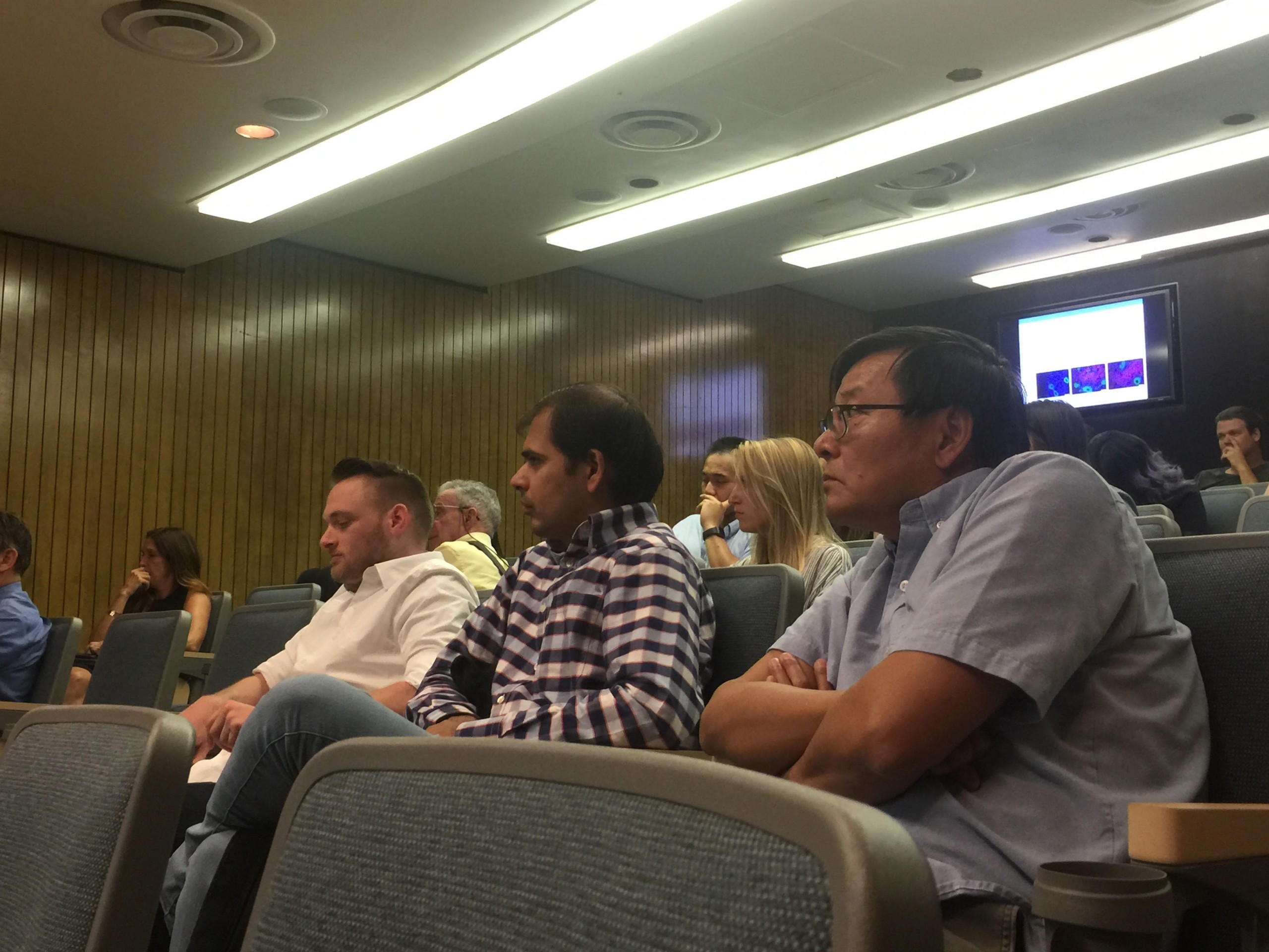 An audience listening to Brian Truong's dissertation defense.