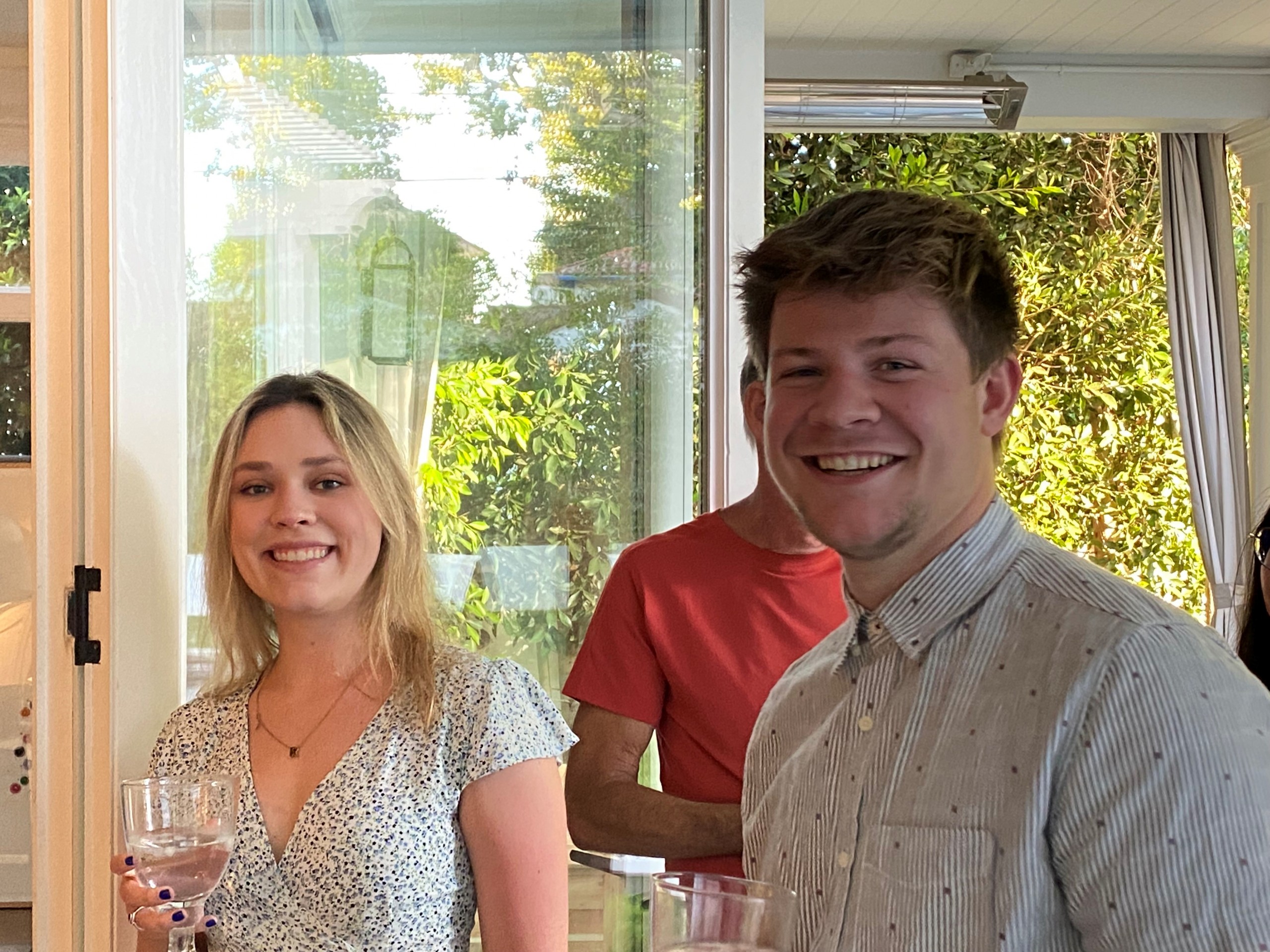 Two students smiling before having dinner