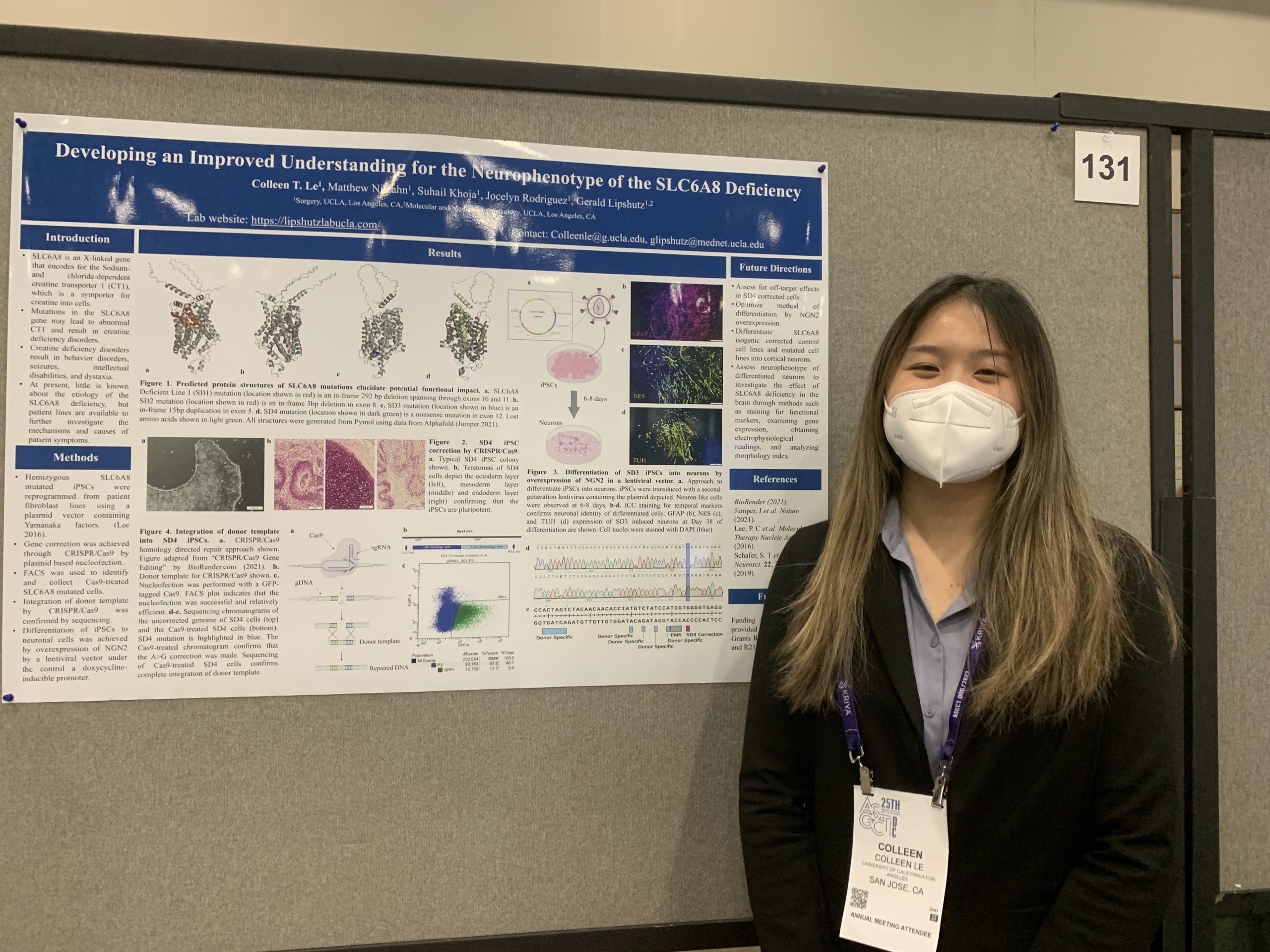 Colleen posing in front of her poster at the 2022 ASGCT meeting in Washington, DC.